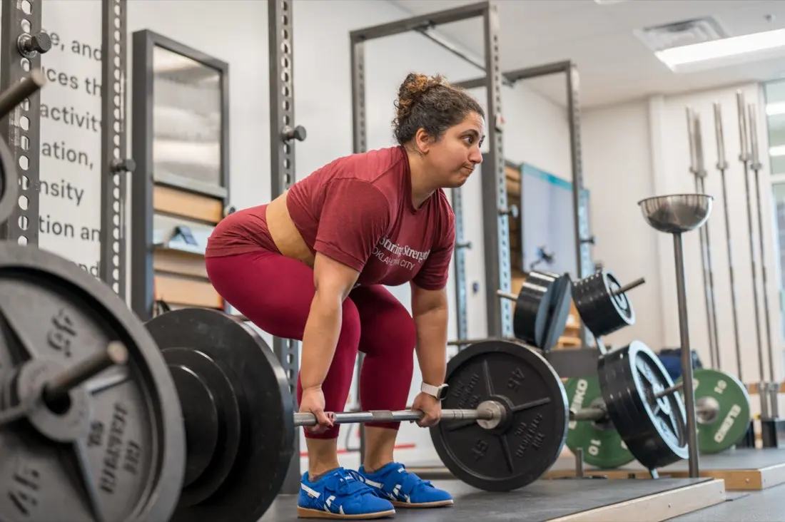 A Starting Strength Oklahoma City member sets up to deadlift